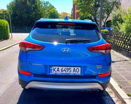 Синий Хендай Туксон, объемом двигателя 2.4 л и пробегом 64 тыс. км за 20500 $, фото 2 на Automoto.ua