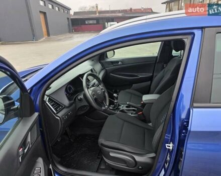 Синий Хендай Туксон, объемом двигателя 1.6 л и пробегом 176 тыс. км за 17800 $, фото 24 на Automoto.ua