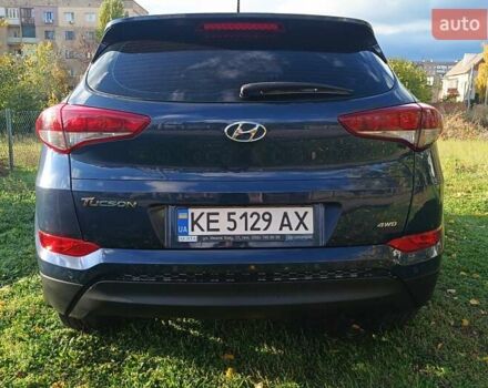 Синий Хендай Туксон, объемом двигателя 2 л и пробегом 83 тыс. км за 17700 $, фото 4 на Automoto.ua