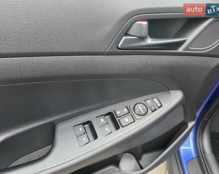 Синий Хендай Туксон, объемом двигателя 1.6 л и пробегом 176 тыс. км за 17800 $, фото 26 на Automoto.ua