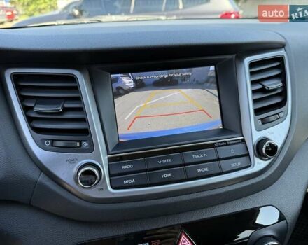 Синий Хендай Туксон, объемом двигателя 2 л и пробегом 108 тыс. км за 16300 $, фото 21 на Automoto.ua