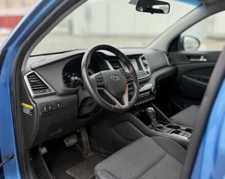 Синий Хендай Туксон, объемом двигателя 2 л и пробегом 58 тыс. км за 17200 $, фото 10 на Automoto.ua