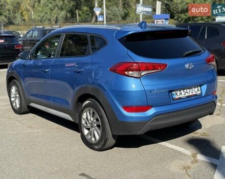 Синий Хендай Туксон, объемом двигателя 2 л и пробегом 108 тыс. км за 16300 $, фото 4 на Automoto.ua