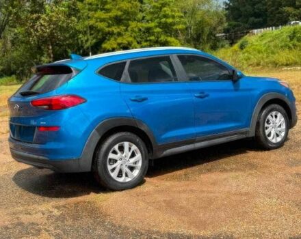 Синий Хендай Туксон, объемом двигателя 2 л и пробегом 99 тыс. км за 5500 $, фото 6 на Automoto.ua