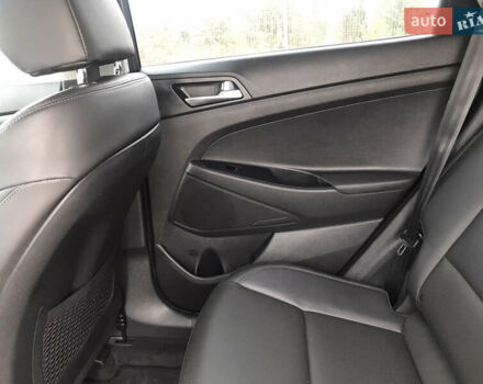 Синий Хендай Туксон, объемом двигателя 2 л и пробегом 145 тыс. км за 21600 $, фото 46 на Automoto.ua