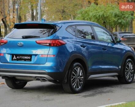 Синій Хендай Туксон, об'ємом двигуна 2.4 л та пробігом 109 тис. км за 17000 $, фото 3 на Automoto.ua