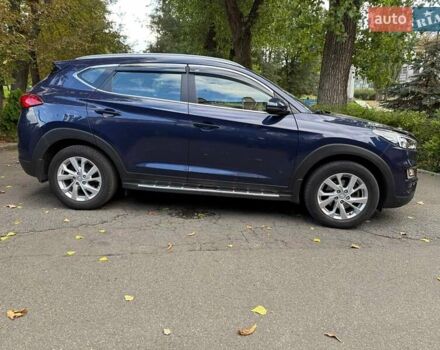 Синий Хендай Туксон, объемом двигателя 2 л и пробегом 48 тыс. км за 22790 $, фото 1 на Automoto.ua