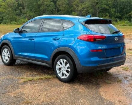 Синий Хендай Туксон, объемом двигателя 2 л и пробегом 99 тыс. км за 5500 $, фото 4 на Automoto.ua