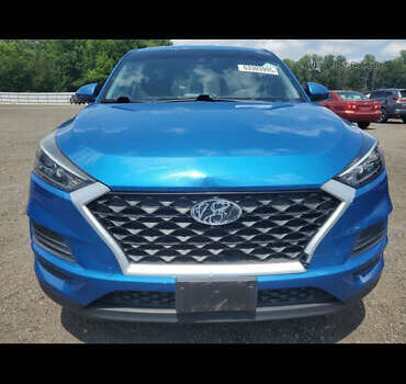 Синій Хендай Туксон, об'ємом двигуна 2 л та пробігом 81 тис. км за 11000 $, фото 4 на Automoto.ua
