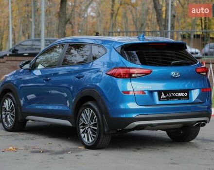Синій Хендай Туксон, об'ємом двигуна 2.4 л та пробігом 109 тис. км за 17000 $, фото 5 на Automoto.ua