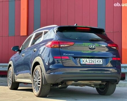 Синий Хендай Туксон, объемом двигателя 2 л и пробегом 111 тыс. км за 22500 $, фото 6 на Automoto.ua