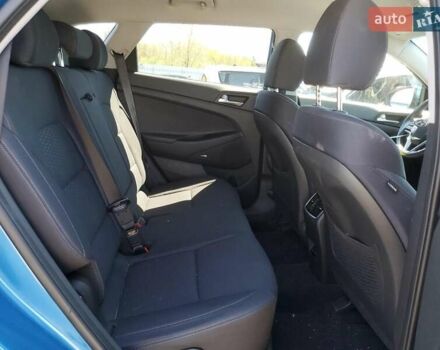 Синій Хендай Туксон, об'ємом двигуна 2.4 л та пробігом 91 тис. км за 2700 $, фото 10 на Automoto.ua
