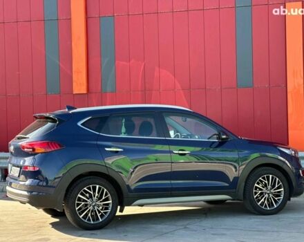 Синий Хендай Туксон, объемом двигателя 2 л и пробегом 111 тыс. км за 22500 $, фото 5 на Automoto.ua