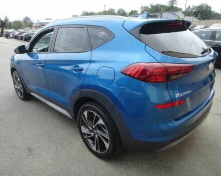 Синий Хендай Туксон, объемом двигателя 2.4 л и пробегом 55 тыс. км за 14000 $, фото 5 на Automoto.ua