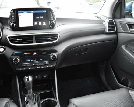 Синий Хендай Туксон, объемом двигателя 2.4 л и пробегом 23 тыс. км за 11000 $, фото 10 на Automoto.ua