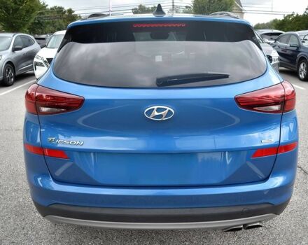 Синий Хендай Туксон, объемом двигателя 2.4 л и пробегом 23 тыс. км за 11000 $, фото 5 на Automoto.ua