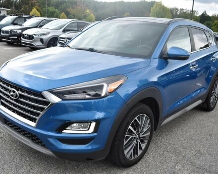 Синий Хендай Туксон, объемом двигателя 2.4 л и пробегом 23 тыс. км за 11000 $, фото 2 на Automoto.ua