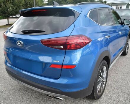 Синий Хендай Туксон, объемом двигателя 2.4 л и пробегом 23 тыс. км за 11000 $, фото 4 на Automoto.ua