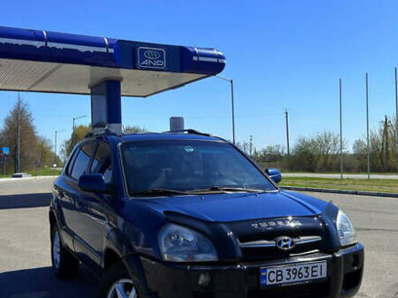 Синий Хендай Туксон, объемом двигателя 2 л и пробегом 320 тыс. км за 6300 $, фото 1 на Automoto.ua