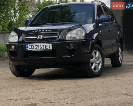Синий Хендай Туксон, объемом двигателя 1.99 л и пробегом 315 тыс. км за 6700 $, фото 1 на Automoto.ua