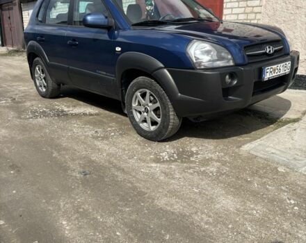 Синий Хендай Туксон, объемом двигателя 2 л и пробегом 172 тыс. км за 4638 $, фото 1 на Automoto.ua