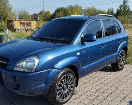 Синий Хендай Туксон, объемом двигателя 2 л и пробегом 310 тыс. км за 6500 $, фото 1 на Automoto.ua