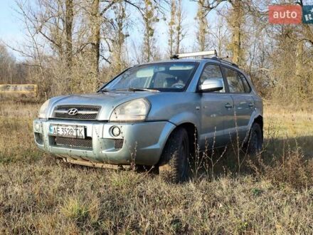 Синий Хендай Туксон, объемом двигателя 1.98 л и пробегом 280 тыс. км за 4800 $, фото 1 на Automoto.ua