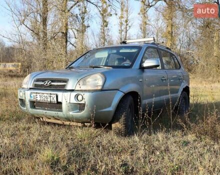Синий Хендай Туксон, объемом двигателя 1.98 л и пробегом 280 тыс. км за 4800 $, фото 1 на Automoto.ua