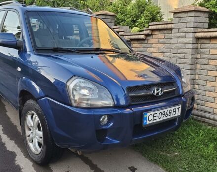 Синий Хендай Туксон, объемом двигателя 2 л и пробегом 205 тыс. км за 7000 $, фото 1 на Automoto.ua