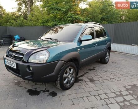 Синий Хендай Туксон, объемом двигателя 1.99 л и пробегом 293 тыс. км за 6500 $, фото 1 на Automoto.ua