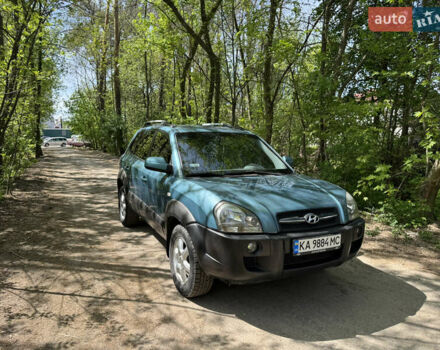 Синий Хендай Туксон, объемом двигателя 1.99 л и пробегом 272 тыс. км за 6500 $, фото 1 на Automoto.ua