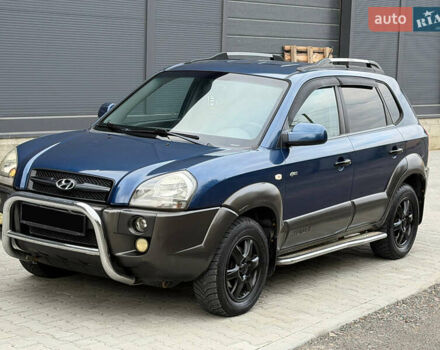 Синий Хендай Туксон, объемом двигателя 2.66 л и пробегом 320 тыс. км за 6300 $, фото 1 на Automoto.ua