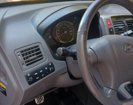 Синій Хендай Туксон, об'ємом двигуна 2 л та пробігом 288 тис. км за 7600 $, фото 1 на Automoto.ua