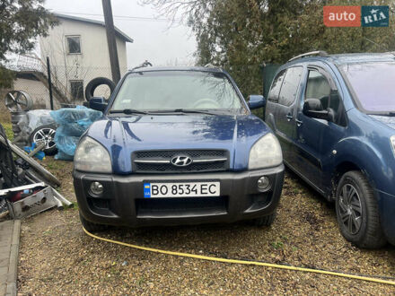 Синий Хендай Туксон, объемом двигателя 2 л и пробегом 245 тыс. км за 6800 $, фото 1 на Automoto.ua