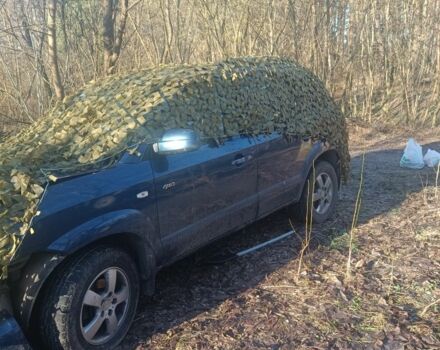 Синий Хендай Туксон, объемом двигателя 2 л и пробегом 300 тыс. км за 1500 $, фото 1 на Automoto.ua