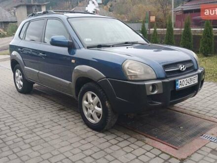 Синий Хендай Туксон, объемом двигателя 2.66 л и пробегом 320 тыс. км за 5500 $, фото 1 на Automoto.ua