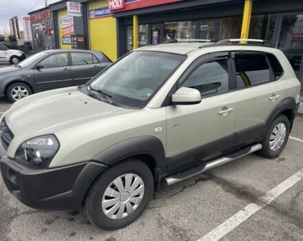 Синий Хендай Туксон, объемом двигателя 2 л и пробегом 271 тыс. км за 4200 $, фото 1 на Automoto.ua