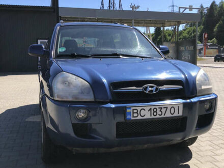 Синий Хендай Туксон, объемом двигателя 1.98 л и пробегом 179 тыс. км за 5700 $, фото 1 на Automoto.ua