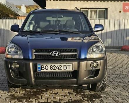 Синий Хендай Туксон, объемом двигателя 1.99 л и пробегом 313 тыс. км за 6000 $, фото 1 на Automoto.ua