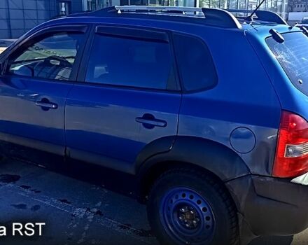 Синій Хендай Туксон, об'ємом двигуна 2 л та пробігом 300 тис. км за 7000 $, фото 1 на Automoto.ua