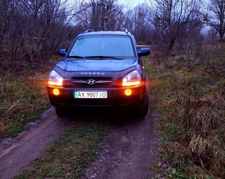 Синий Хендай Туксон, объемом двигателя 2 л и пробегом 219 тыс. км за 8400 $, фото 1 на Automoto.ua