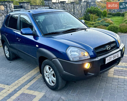 Синий Хендай Туксон, объемом двигателя 2 л и пробегом 218 тыс. км за 7850 $, фото 1 на Automoto.ua