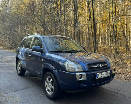 Синий Хендай Туксон, объемом двигателя 2 л и пробегом 271 тыс. км за 3500 $, фото 1 на Automoto.ua