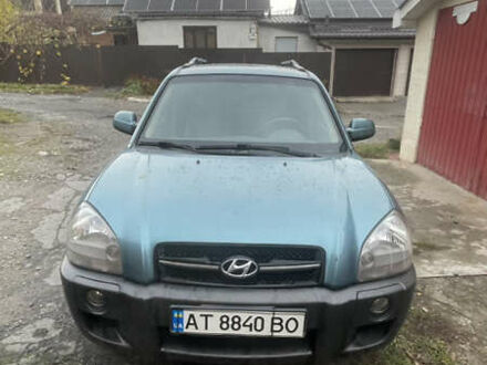 Синий Хендай Туксон, объемом двигателя 1.98 л и пробегом 277 тыс. км за 7500 $, фото 1 на Automoto.ua