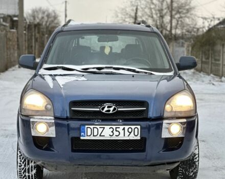 Синий Хендай Туксон, объемом двигателя 2 л и пробегом 263 тыс. км за 3899 $, фото 1 на Automoto.ua