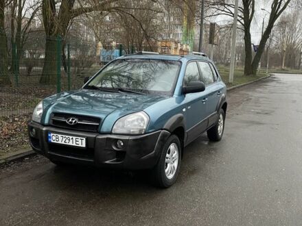 Синій Хендай Туксон, об'ємом двигуна 2 л та пробігом 220 тис. км за 6600 $, фото 1 на Automoto.ua