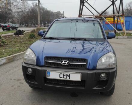 Синий Хендай Туксон, объемом двигателя 2 л и пробегом 225 тыс. км за 7300 $, фото 1 на Automoto.ua