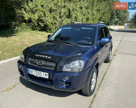 Синий Хендай Туксон, объемом двигателя 1.98 л и пробегом 152 тыс. км за 7450 $, фото 1 на Automoto.ua