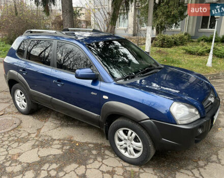 Синий Хендай Туксон, объемом двигателя 2 л и пробегом 190 тыс. км за 7500 $, фото 1 на Automoto.ua