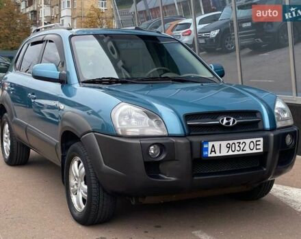 Синий Хендай Туксон, объемом двигателя 1.98 л и пробегом 211 тыс. км за 7900 $, фото 1 на Automoto.ua